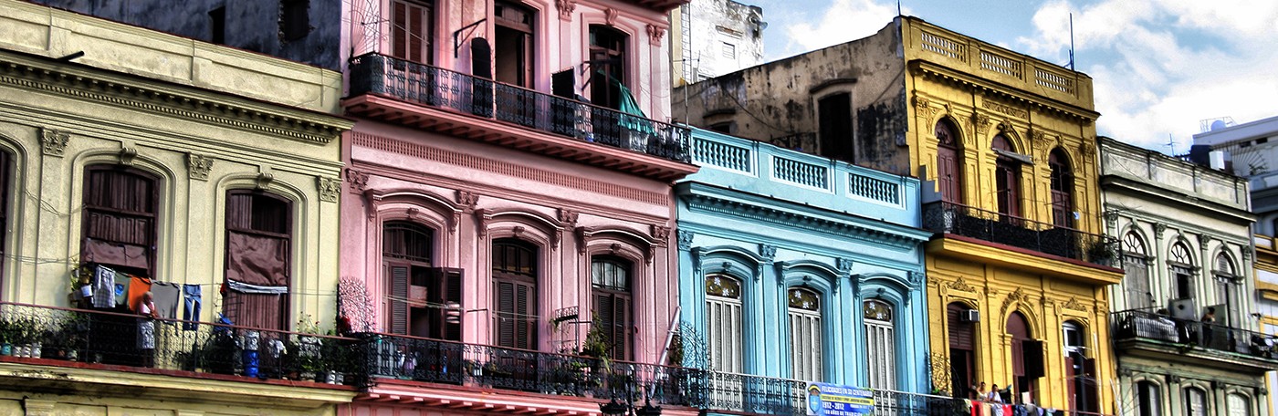 A row of colorful building facades in Havana, Cuba
