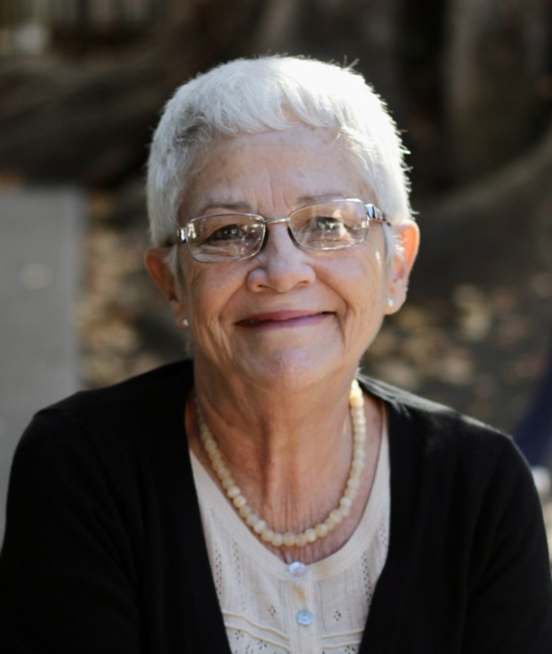 Angela Rojas is smiling for the camera